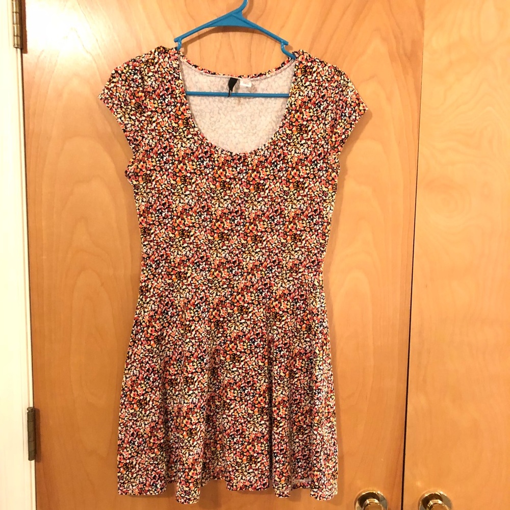 Mini floral print jersey scoop neck dress.